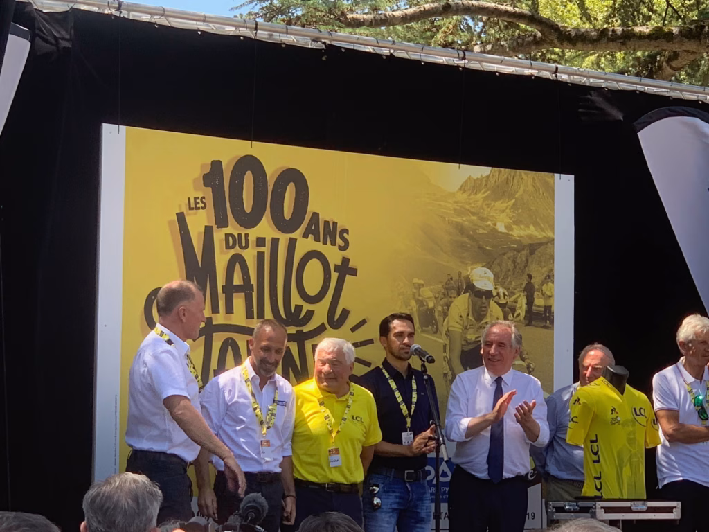 A photograph taken at the 100 years of the Maillot Jaune (yellow jersey) celebration in Pau in 2019. Copyright Peyroulat.