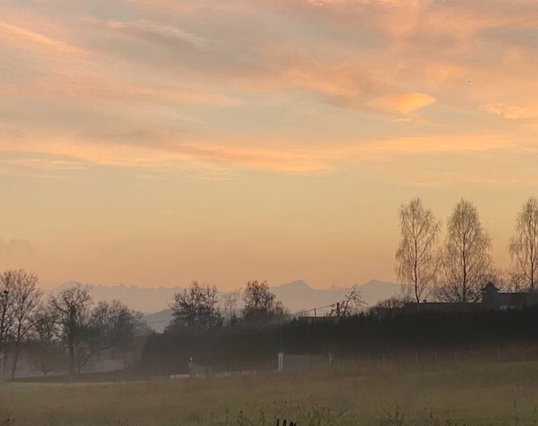 A countryside and Pyrenees view from the Way of St James Arles route in South-West France.