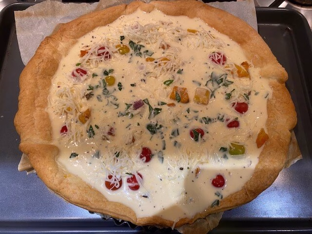 Butternut squash quiche before baking